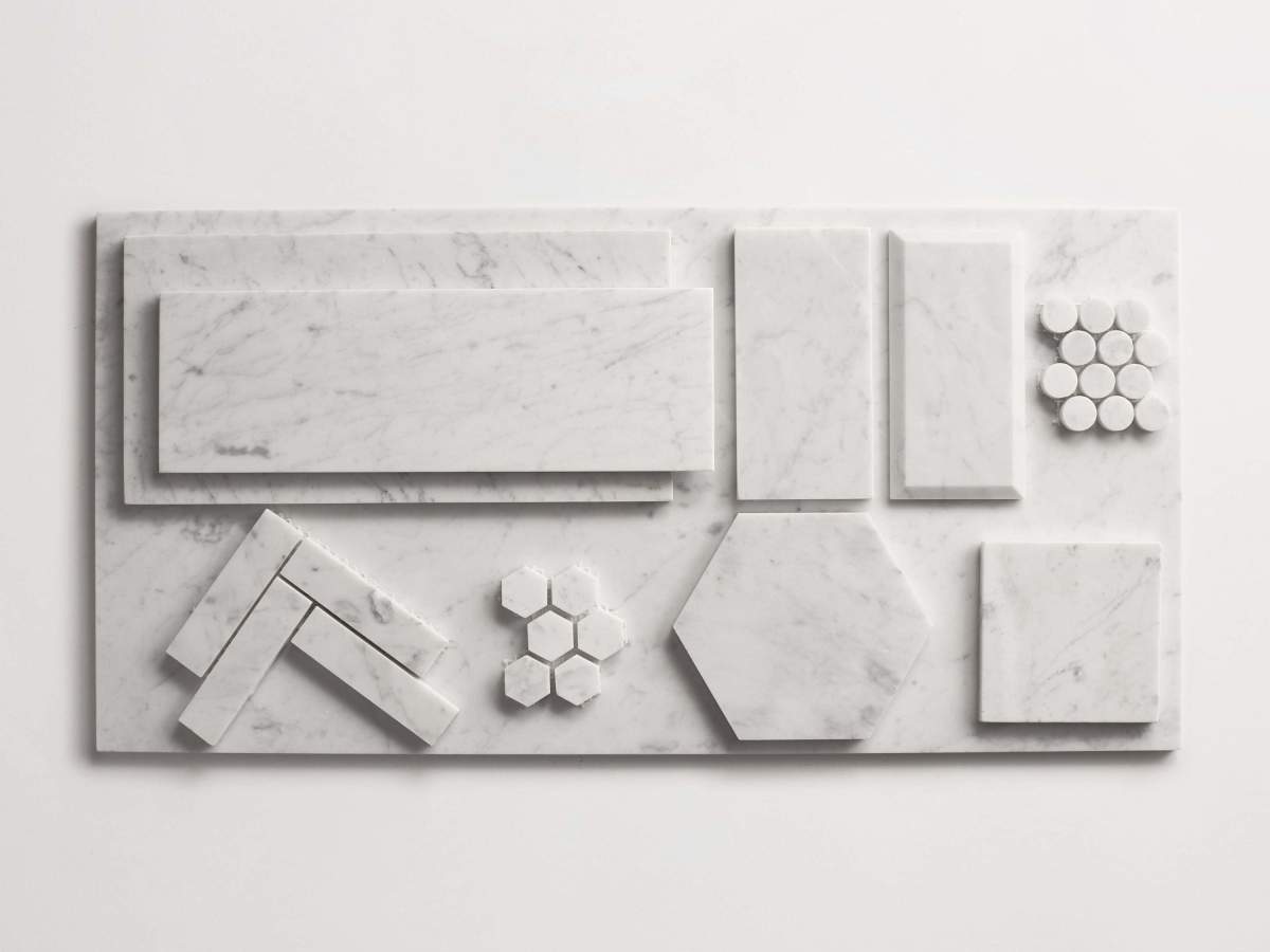 Tile carrara marble white stone herringbone mosaic.