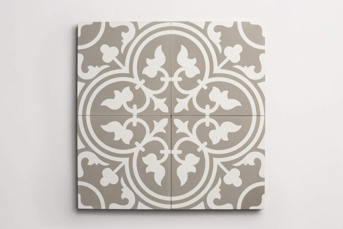 Tile concrete cement four leaf clover white on grey.