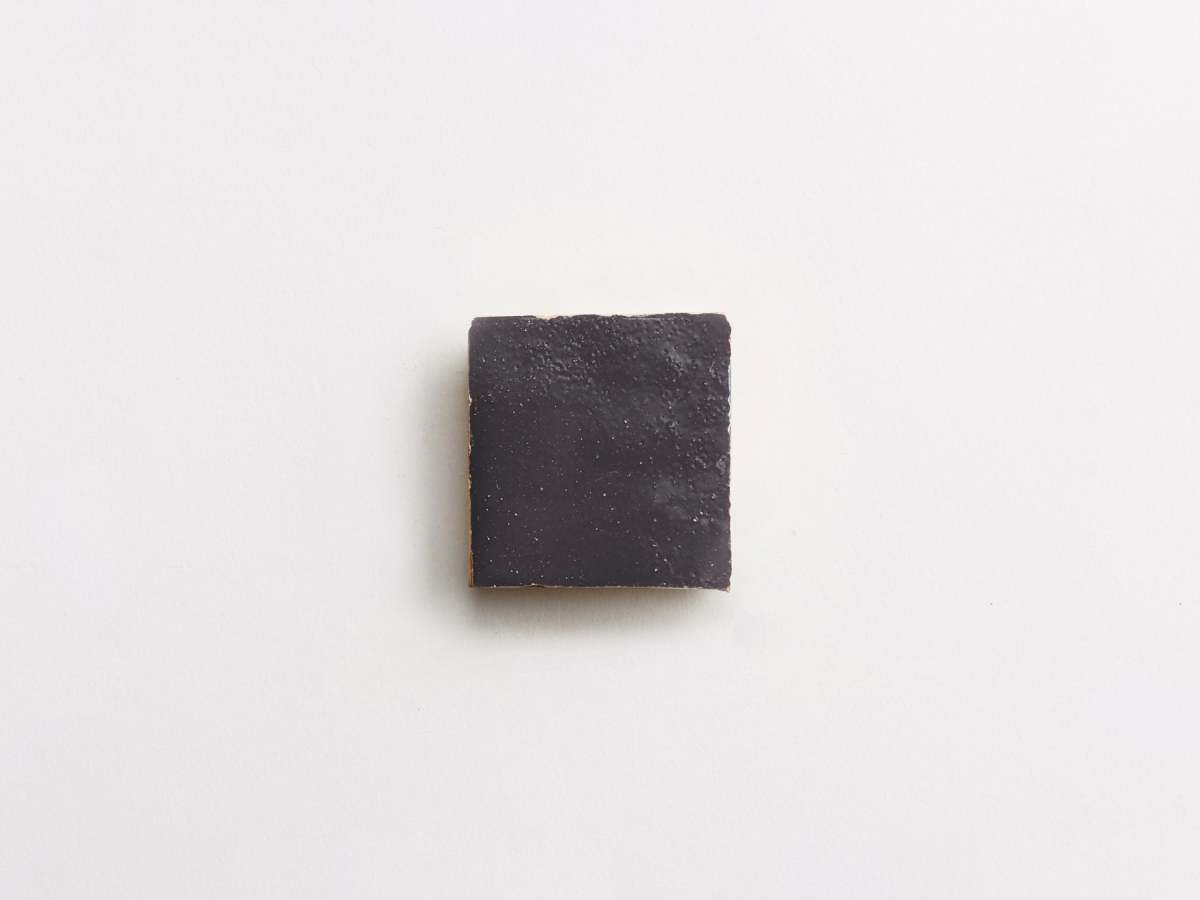 Zellige tile grey glaze battled armor 2" square.
