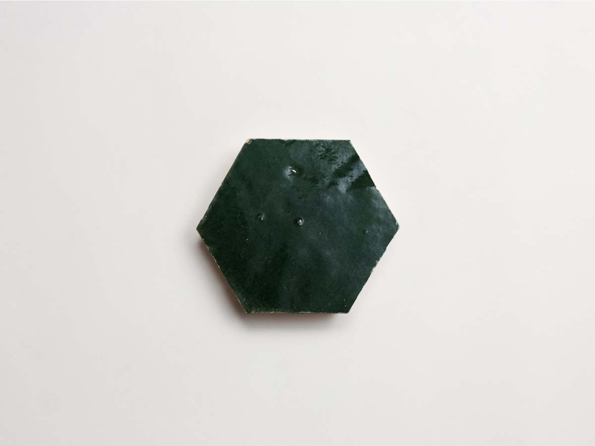Dark green zellige tile cindered olive hexagon.