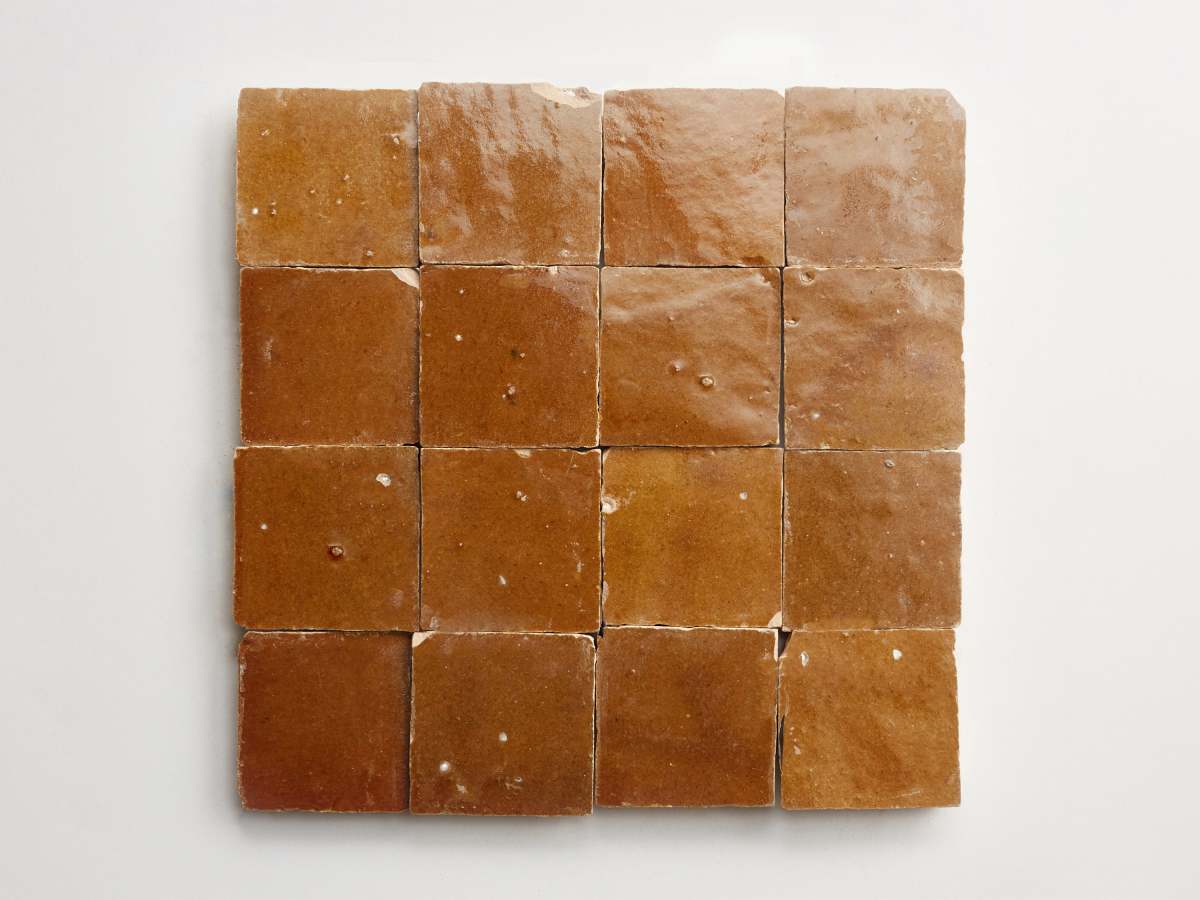 Golden henna zellige moroccan terracotta tile.