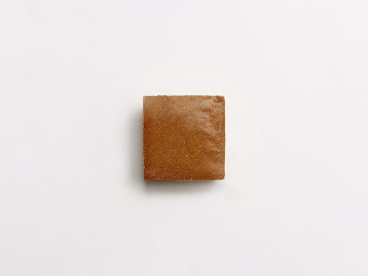 Golden henna zellige moroccan terracotta tile.