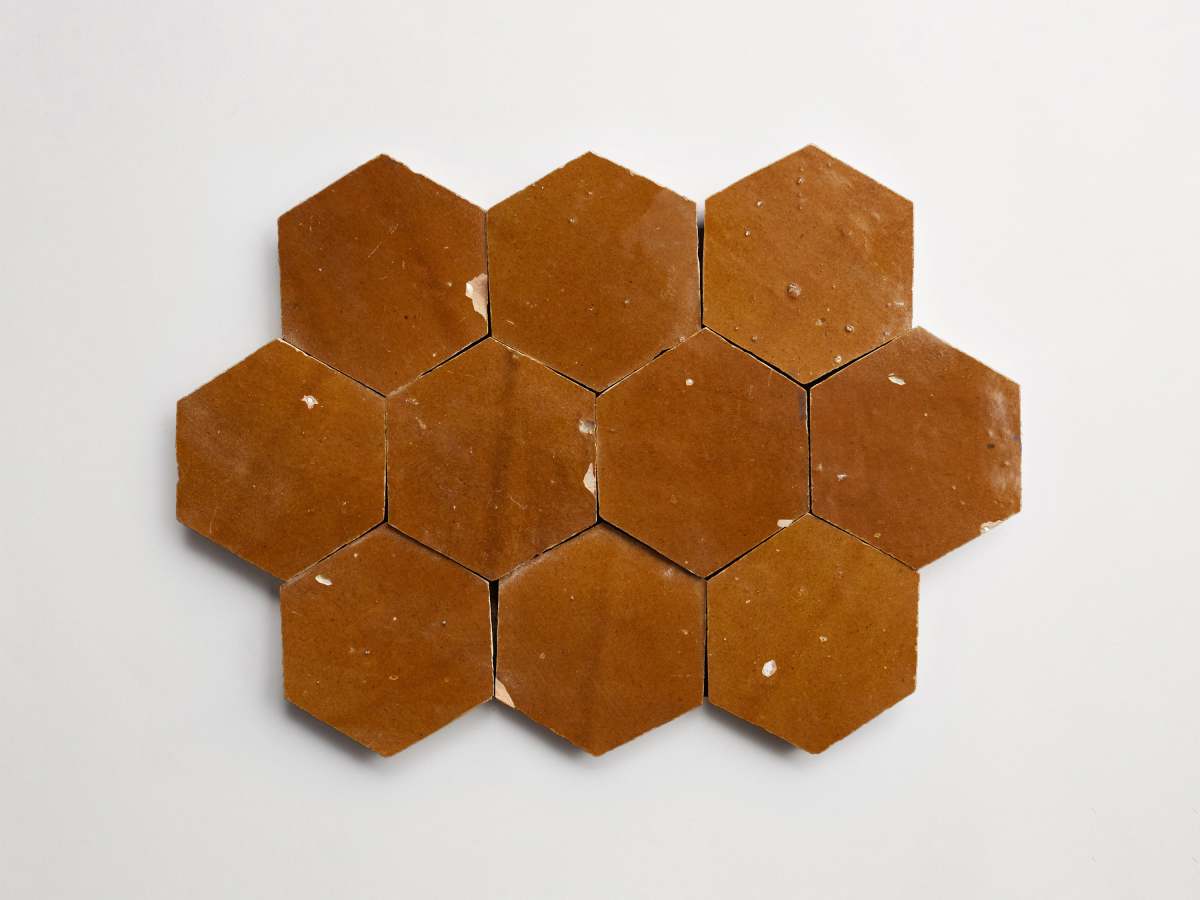 Zellige tile terracotta golden henna brown hexagon.