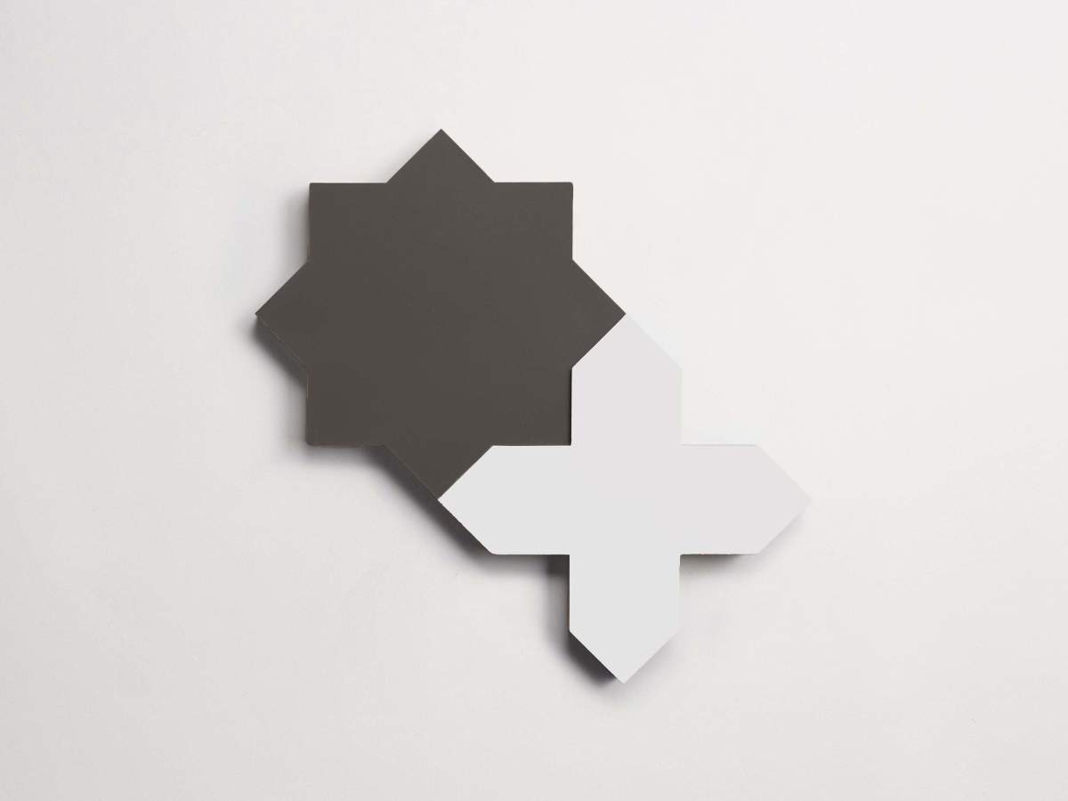 Tile cement pavimenti charcoal star + white cross.