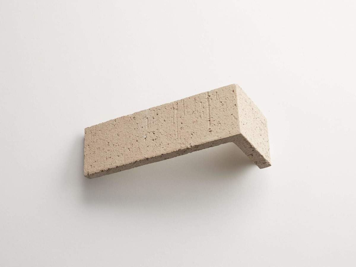 Sand cast corner standard issue foundry flats tile.