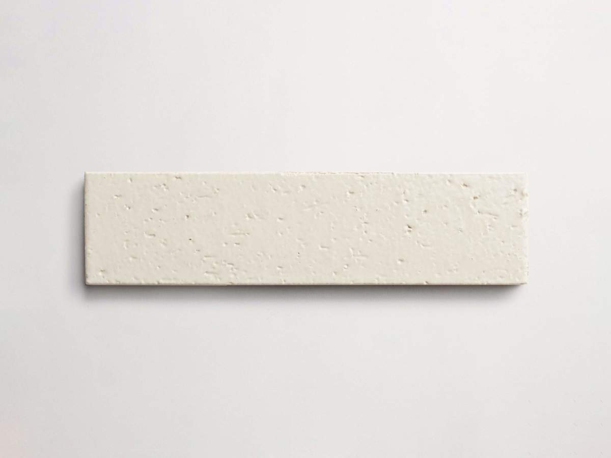 Modern farmhouse glazed brick subway cream gloss tile.