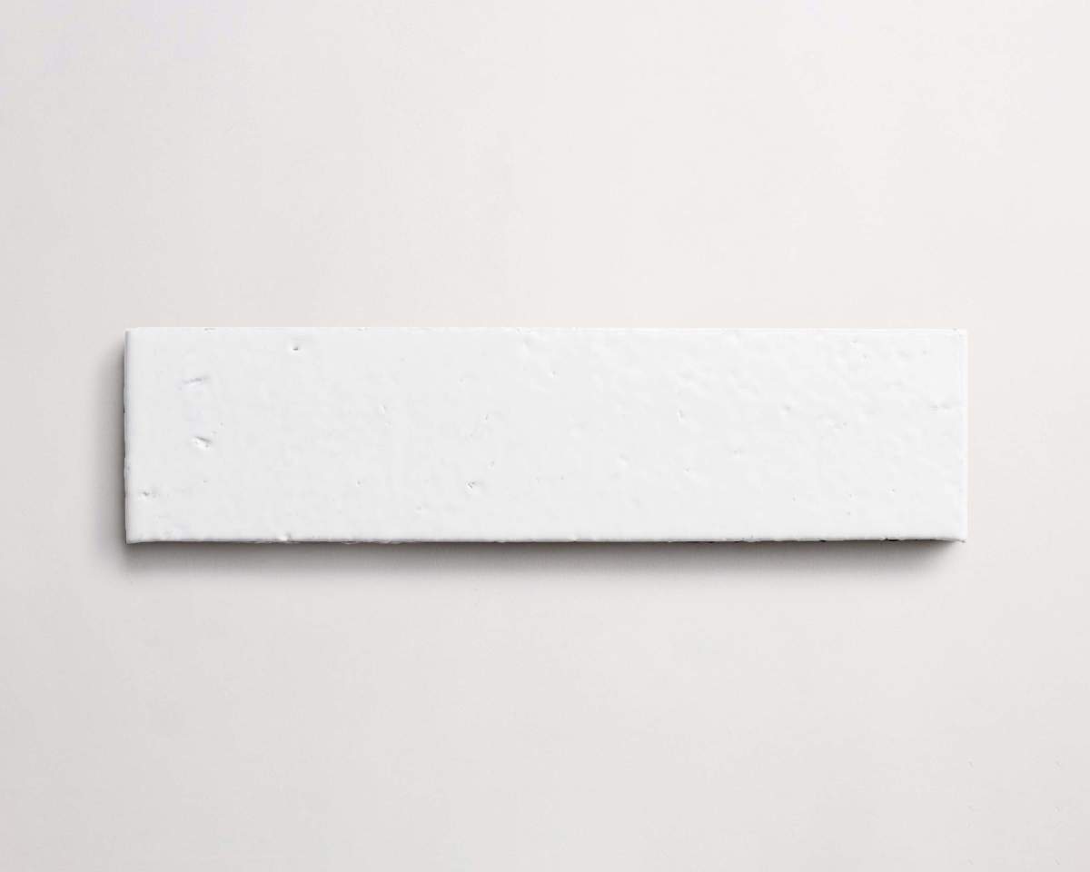 Modern farmhouse glazed brick subway gloss white tile.
