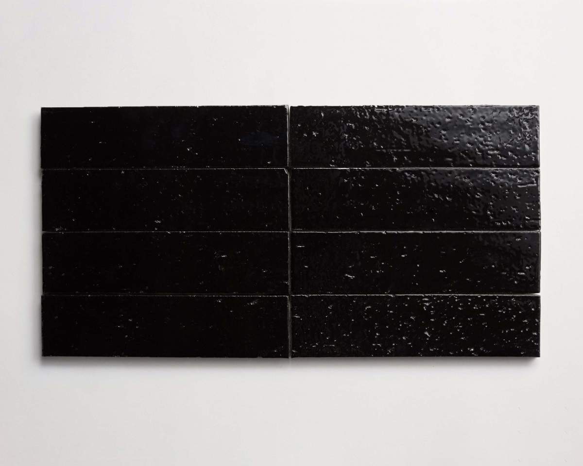 Modern farmhouse glazed brick subway gloss black tile.