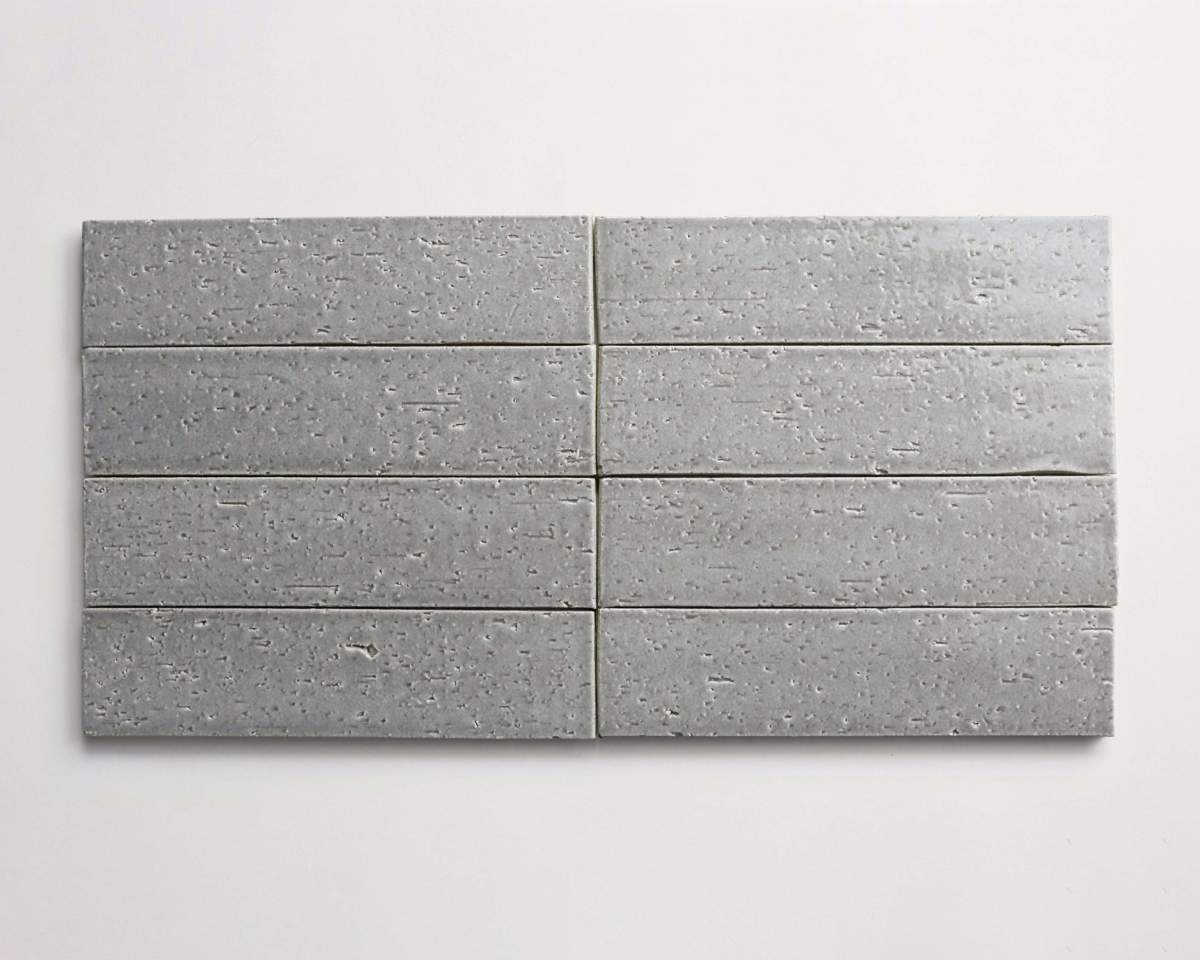 Modern farmhouse glazed brick subway gloss grey tile.