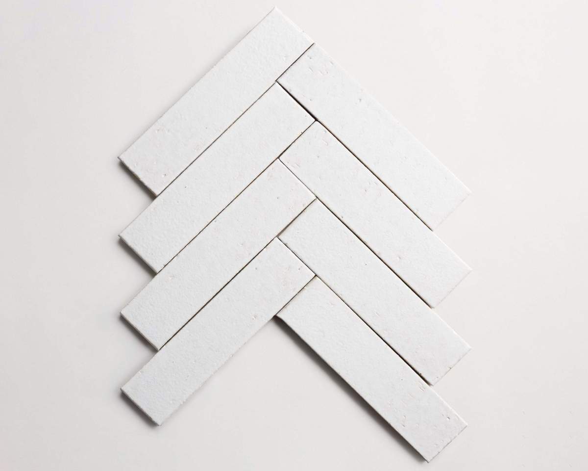 Modern farmhouse glazed brick subway matte white tile.