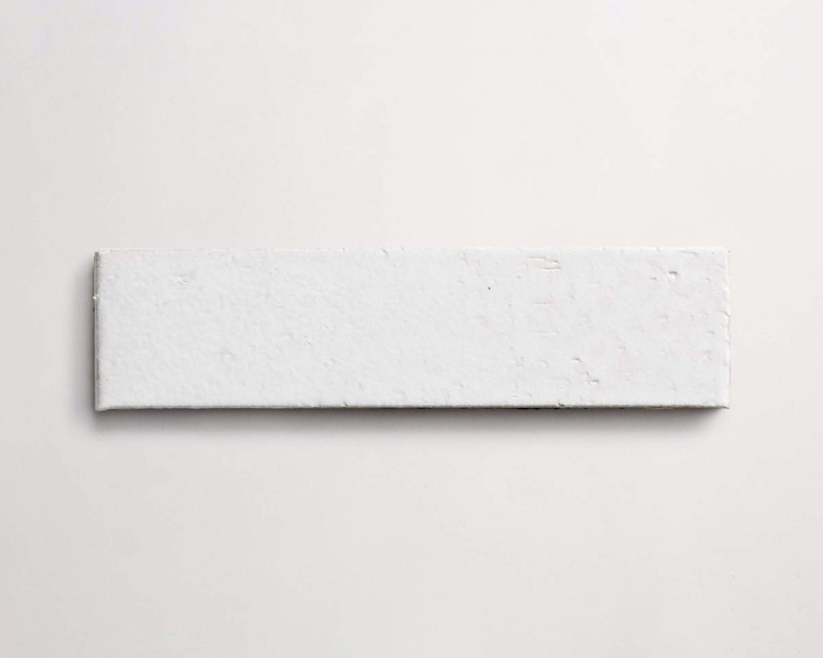 Modern farmhouse glazed brick subway matte white tile.