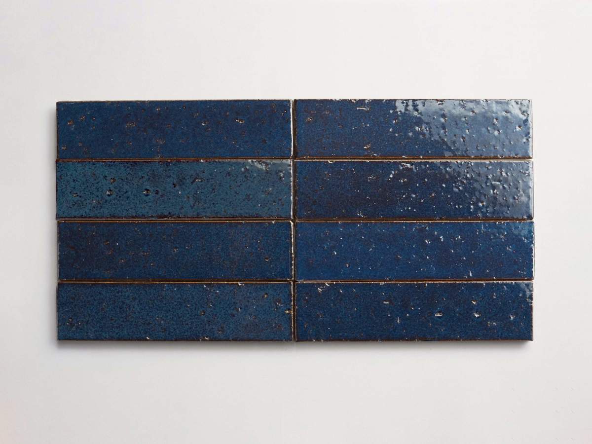 Modern farmhouse glazed brick brindled blue gloss tile.