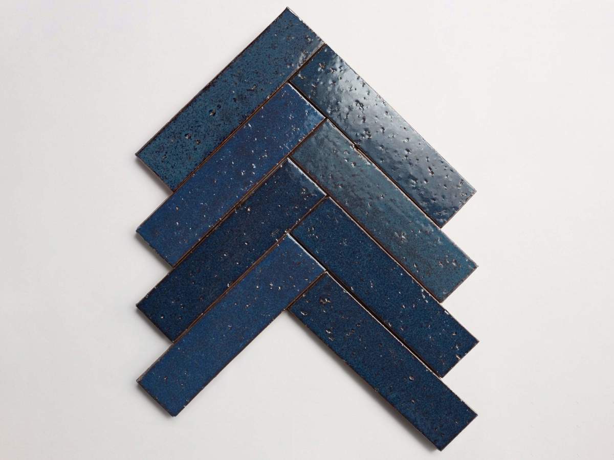 Modern farmhouse glazed brick brindled blue gloss tile.