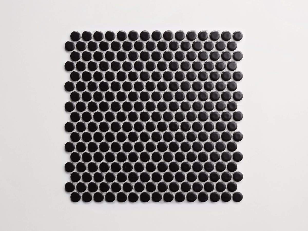 Tile ceramic penny round black matte.