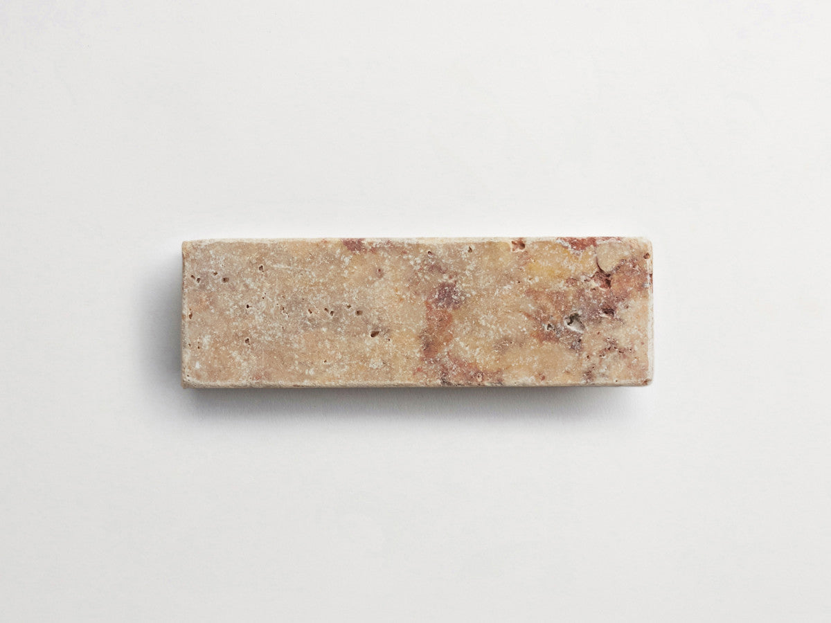 Pantry pavers tumbled travertine 2x6 pumice tile.