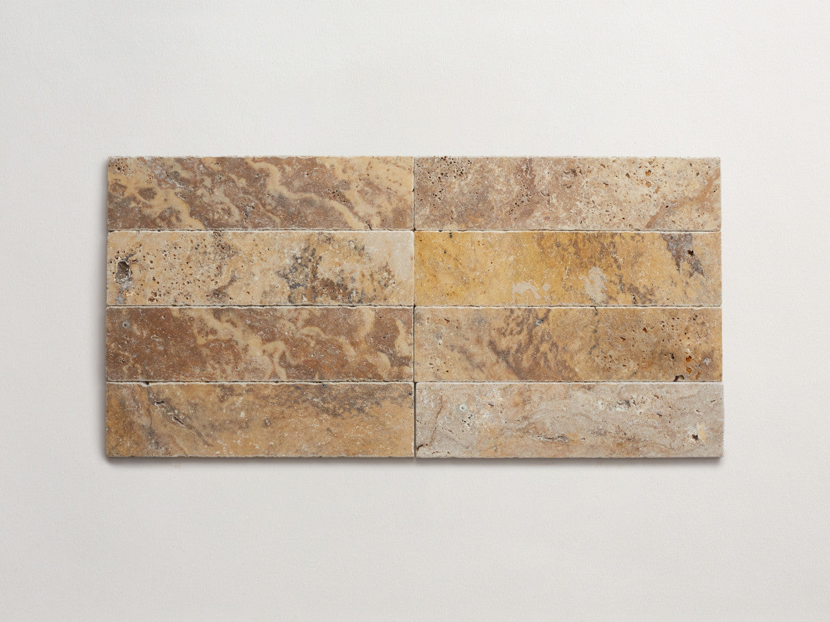 Pantry pavers tumbled travertine 3x12 pumice tile.