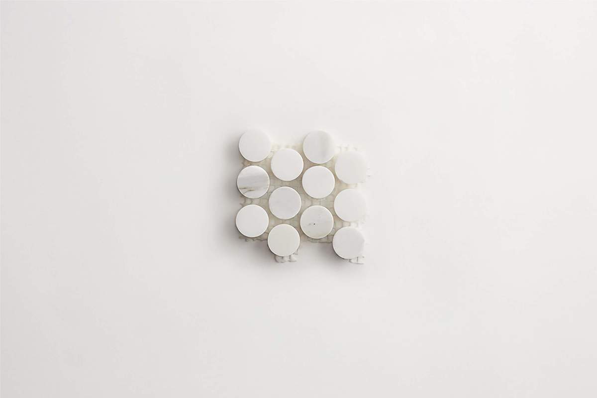 Premier Stone Tile honed white gold marble round ¾ x ¾.