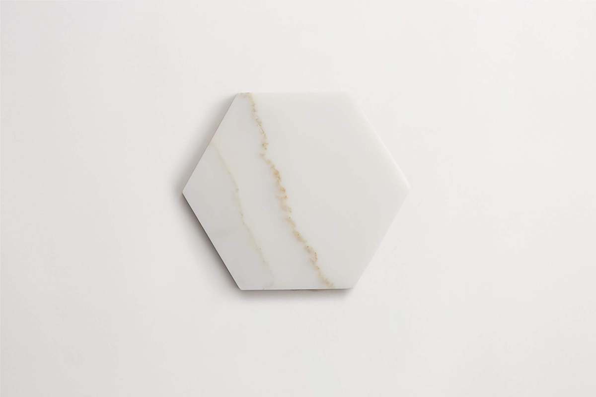 Premier Stone Tile honed white gold marble hex 5¾ x 5.