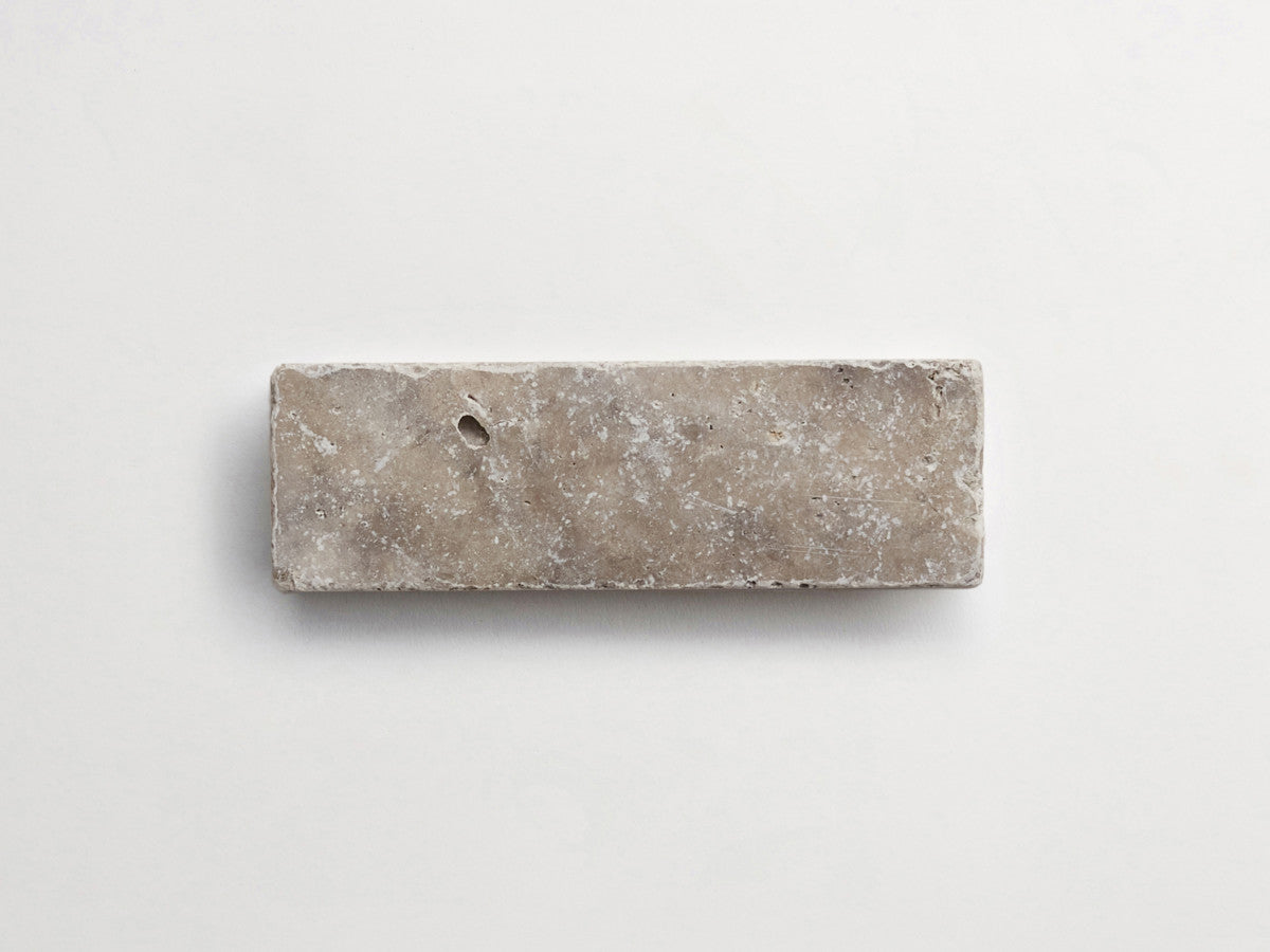Pantry pavers tumbled travertine 2x6 shale tile.