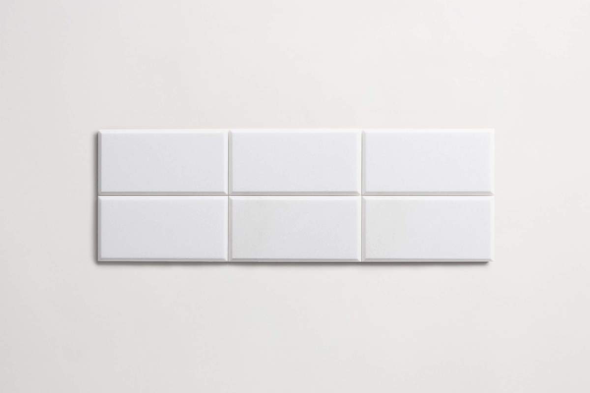 Tile thassos white stone beveled subway.