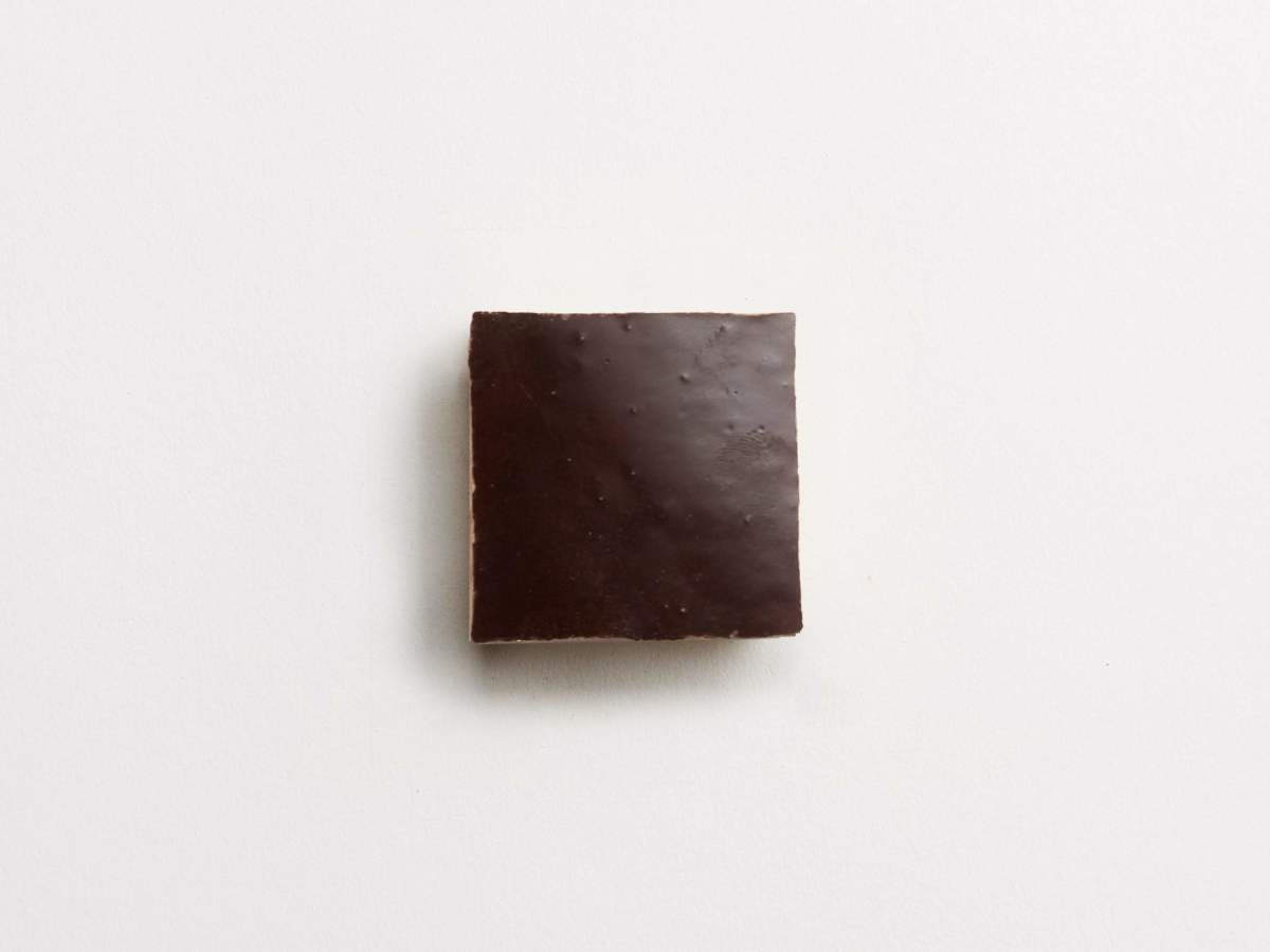 Zellige tile brown glaze argan brown 2" square.