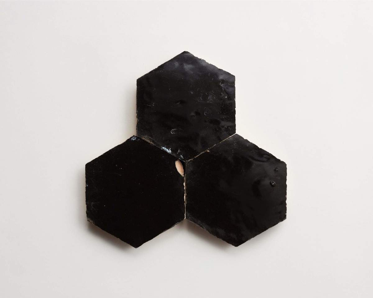 Dark zellige tile scribe's ink black hexagon.