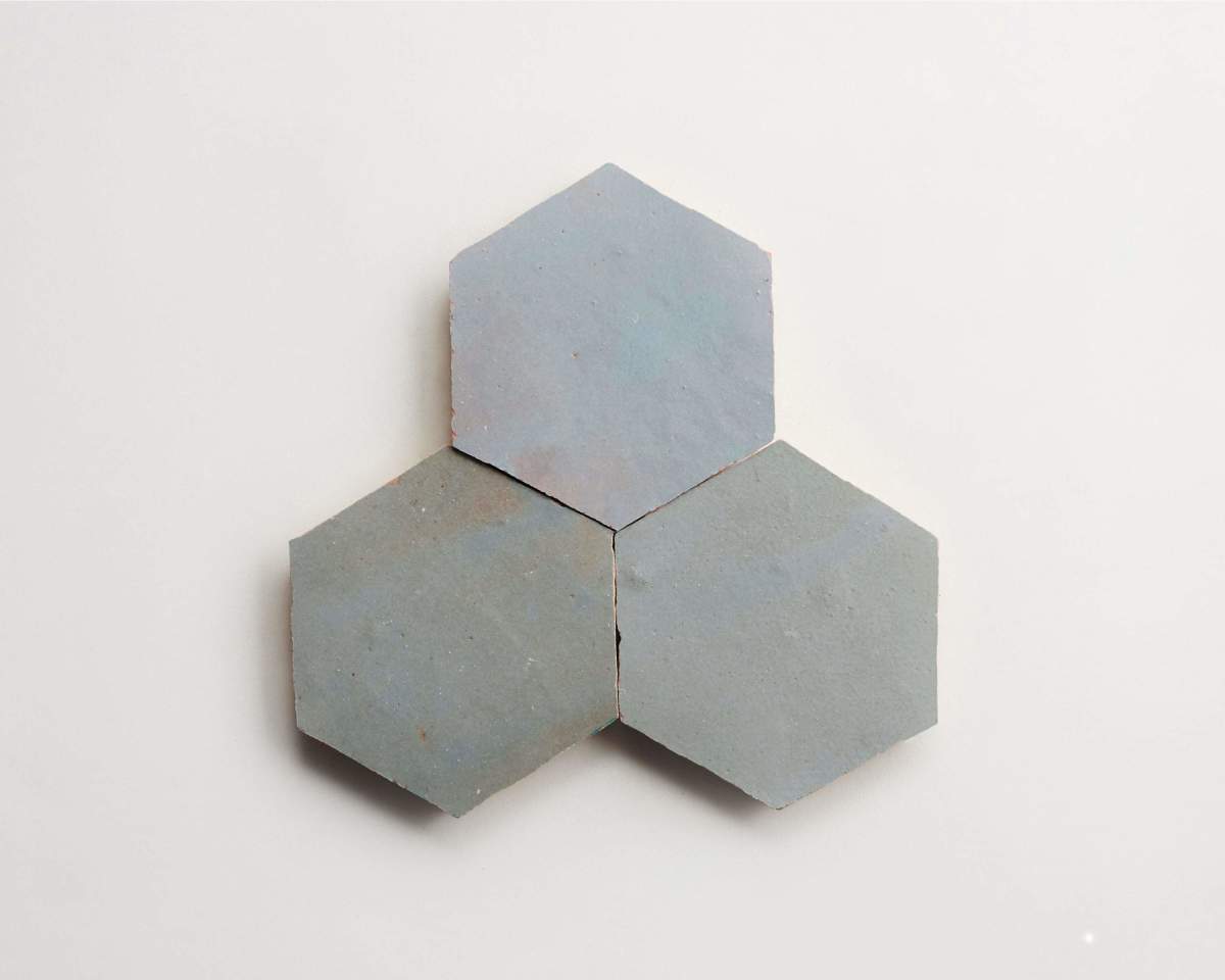 Light blue zellige tile shattered pearl hexagon.