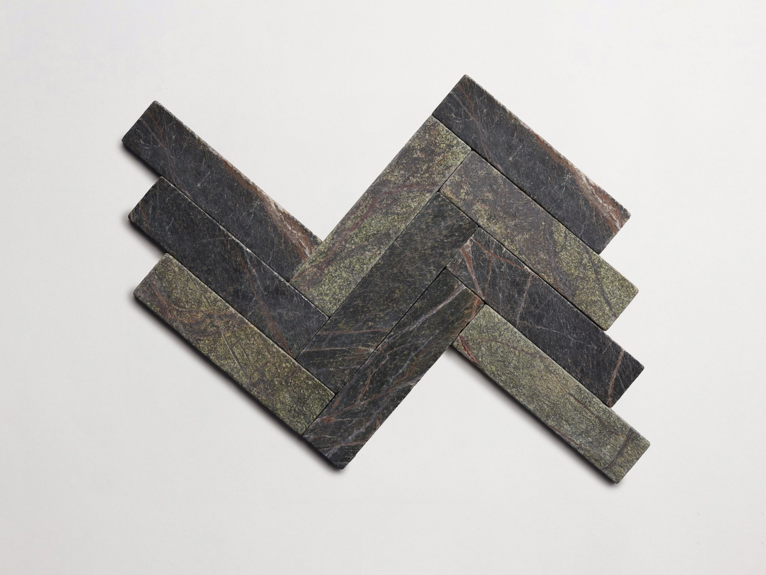 cle-tile-stone-tumbled-lapidary-cigar-herringbone-rainforest-green-3000x2250-300dpi.jpg