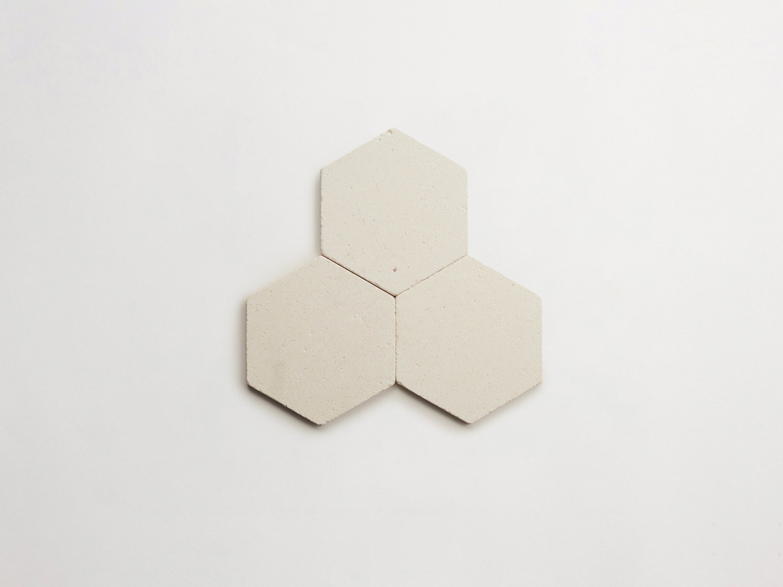 cle-tile-stone-tumbled-lapidary-white-limestone-hex-3up-3000x2250-300dpi .jpg