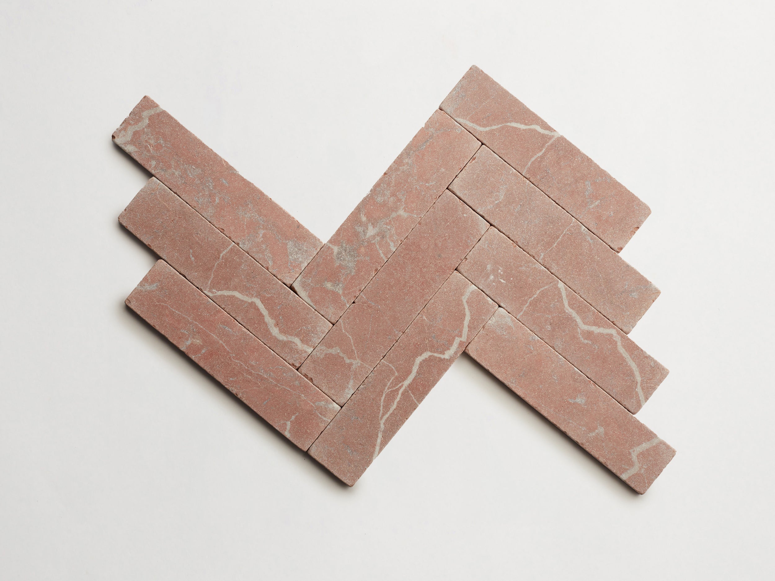 cle-tile-stone-tumbled-lapidary-rojo-alicante-cigar-herringbone-3000x3000-300dpi.jpg
