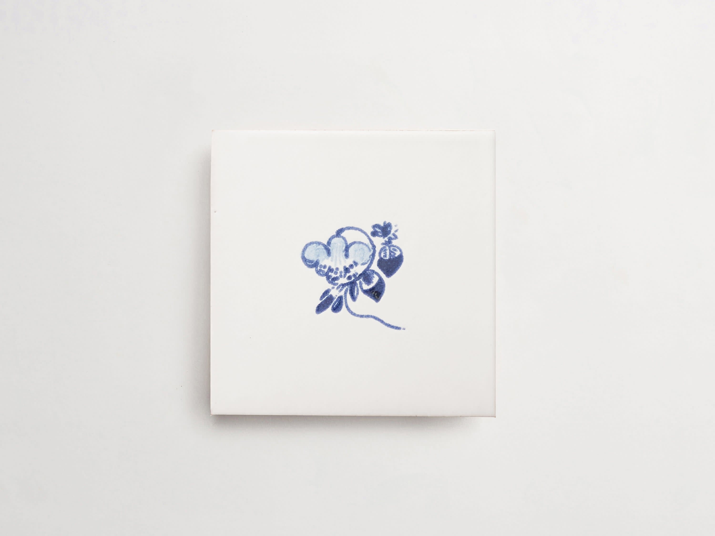 hand painted tile blue flowers white ceramic maiolica delft