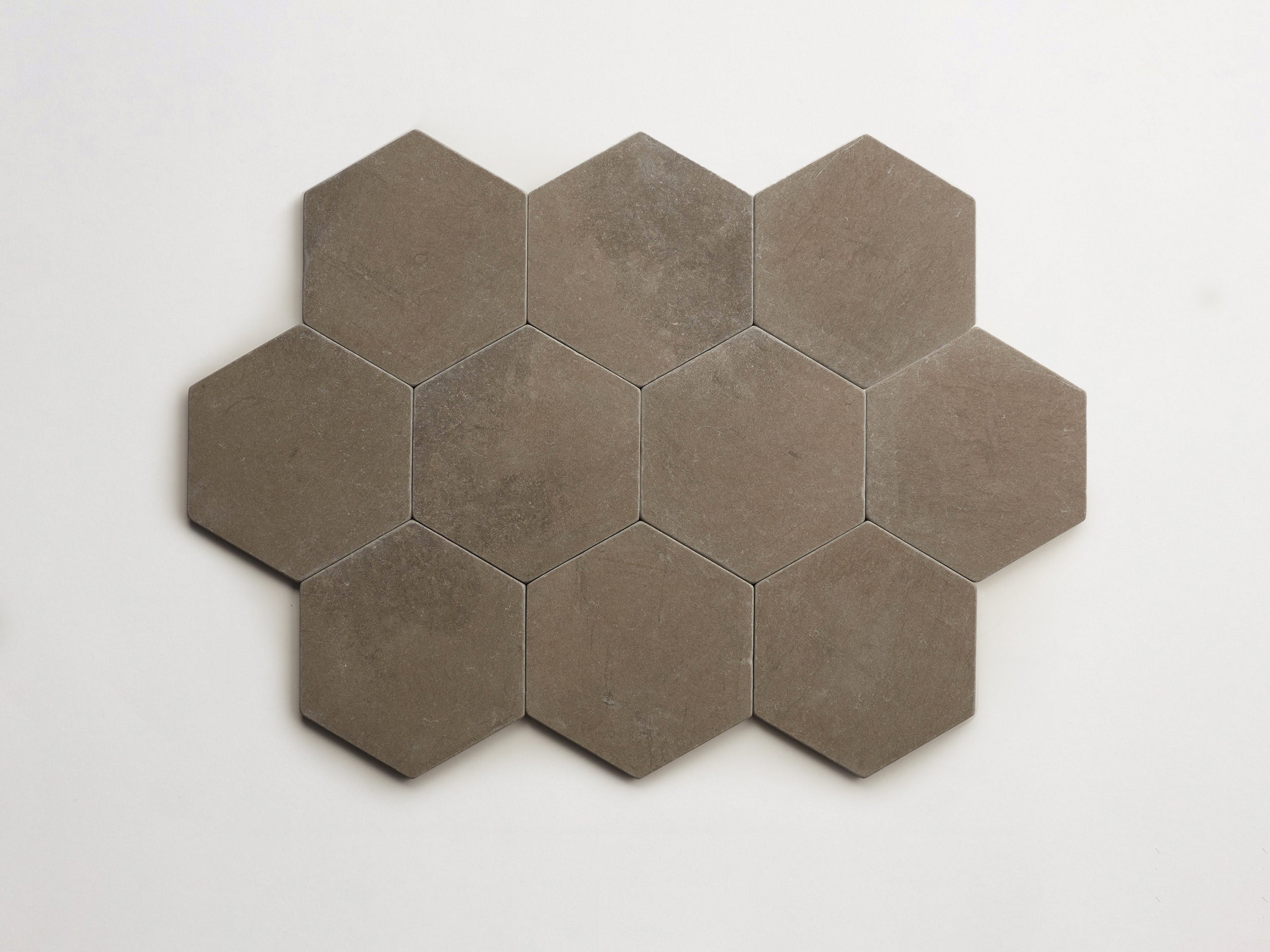 cle-tile-stone-tumbled-lapidary-foussana-grey-hex-10up-3000x2250-300dpi .jpg