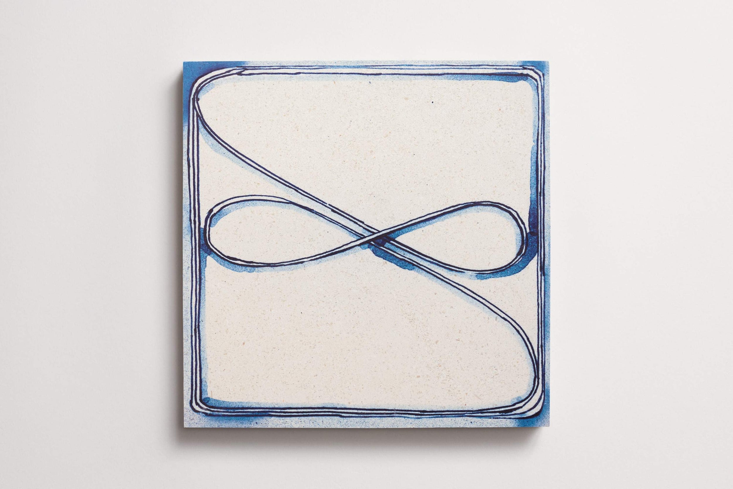 cle_tile_limestone_ruan_hoffmann_mlm_delft_infinite_pks_square_12x12_single_aerial_3.0_1.jpg