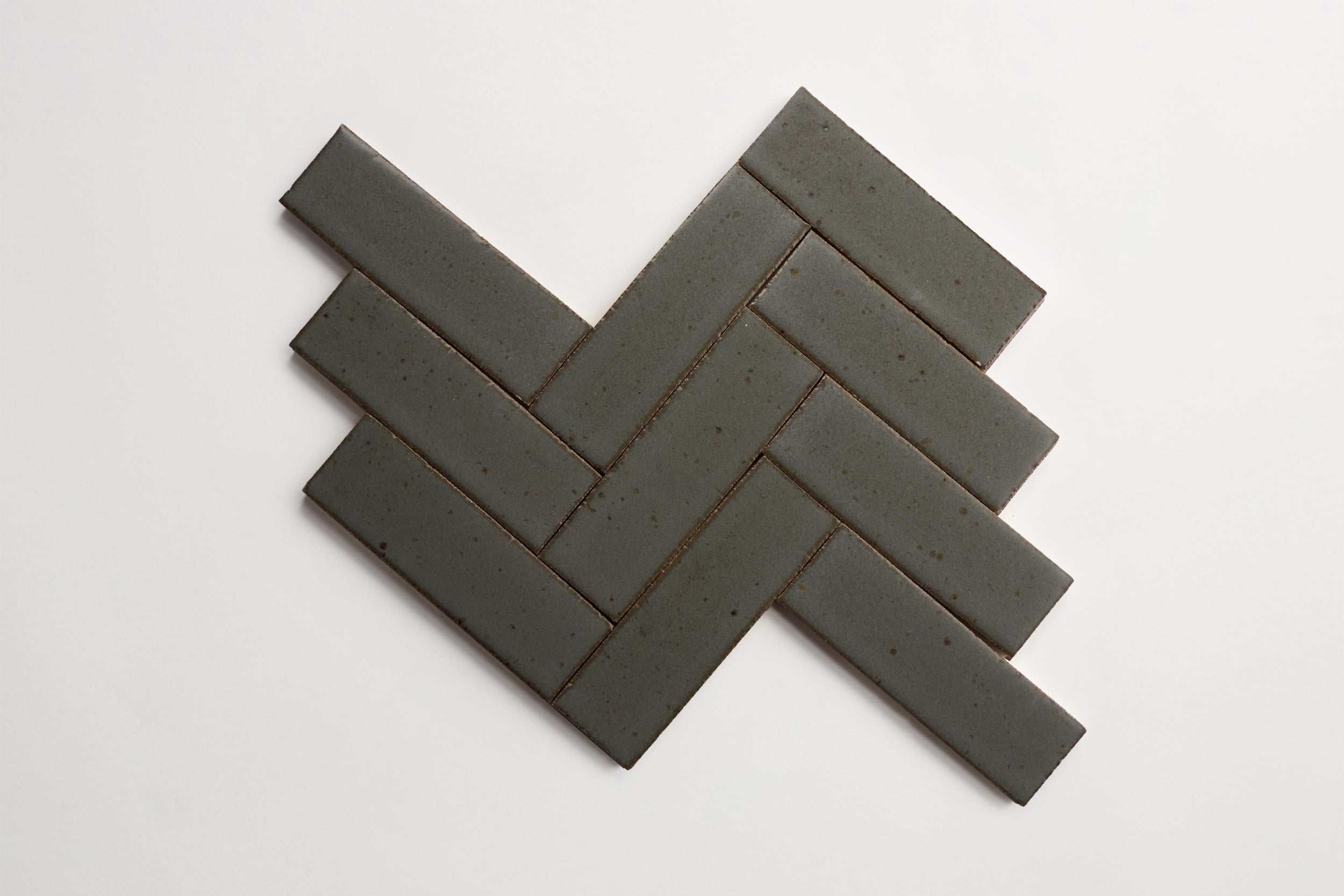 cle-tile-brick-herringbone-secondshelf-guild-ca21787.jpg