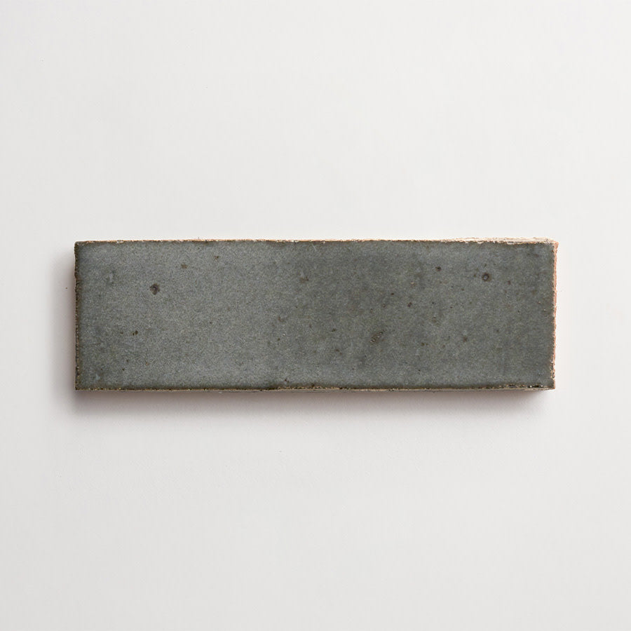 clé guild | thin glazed brick | black wool | 8 x 2.5 x 0.5