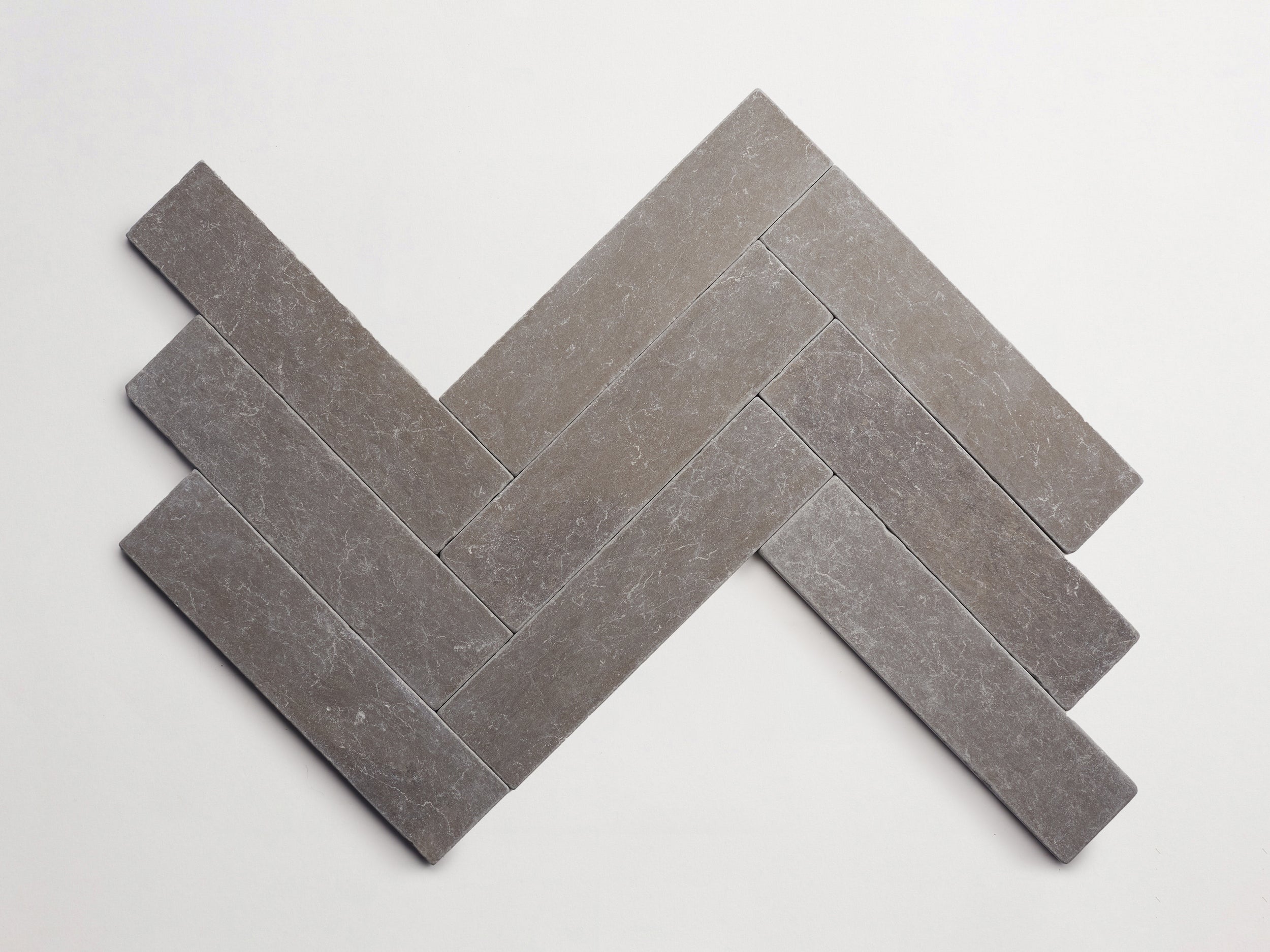 cle-tile-stone-tumbled-lapidary-blade-herringbone-cashmere-grey-3000x2250-300dpi.jpg