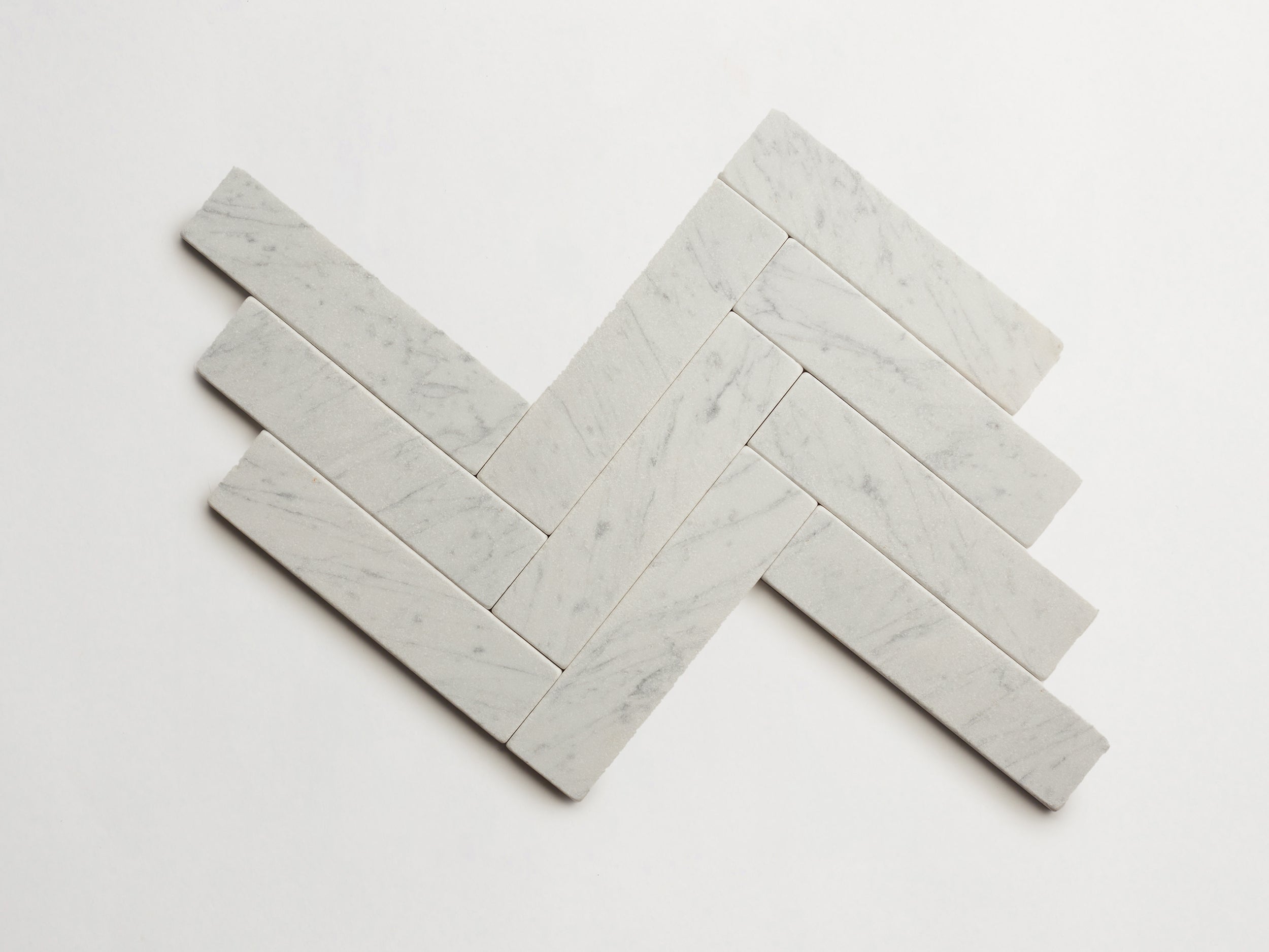 cle-tile-stone-tumbled-lapidary-carrara-cigar-herringbone-3000x3000-300dpi.jpg