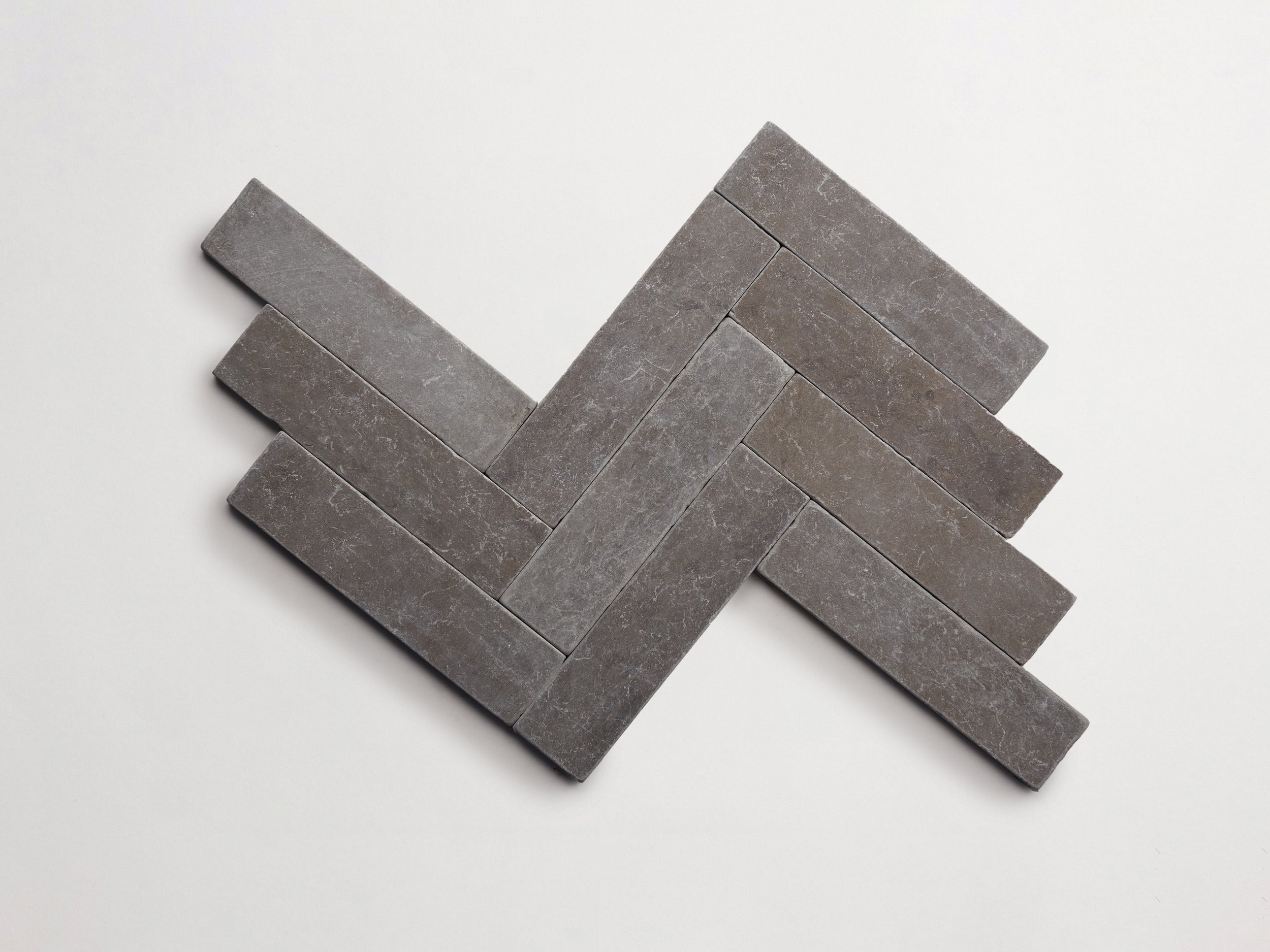 cle-tile-stone-tumbled-lapidary-cigar-herringbone-cashmere-grey-3000x2250-300dpi.jpg