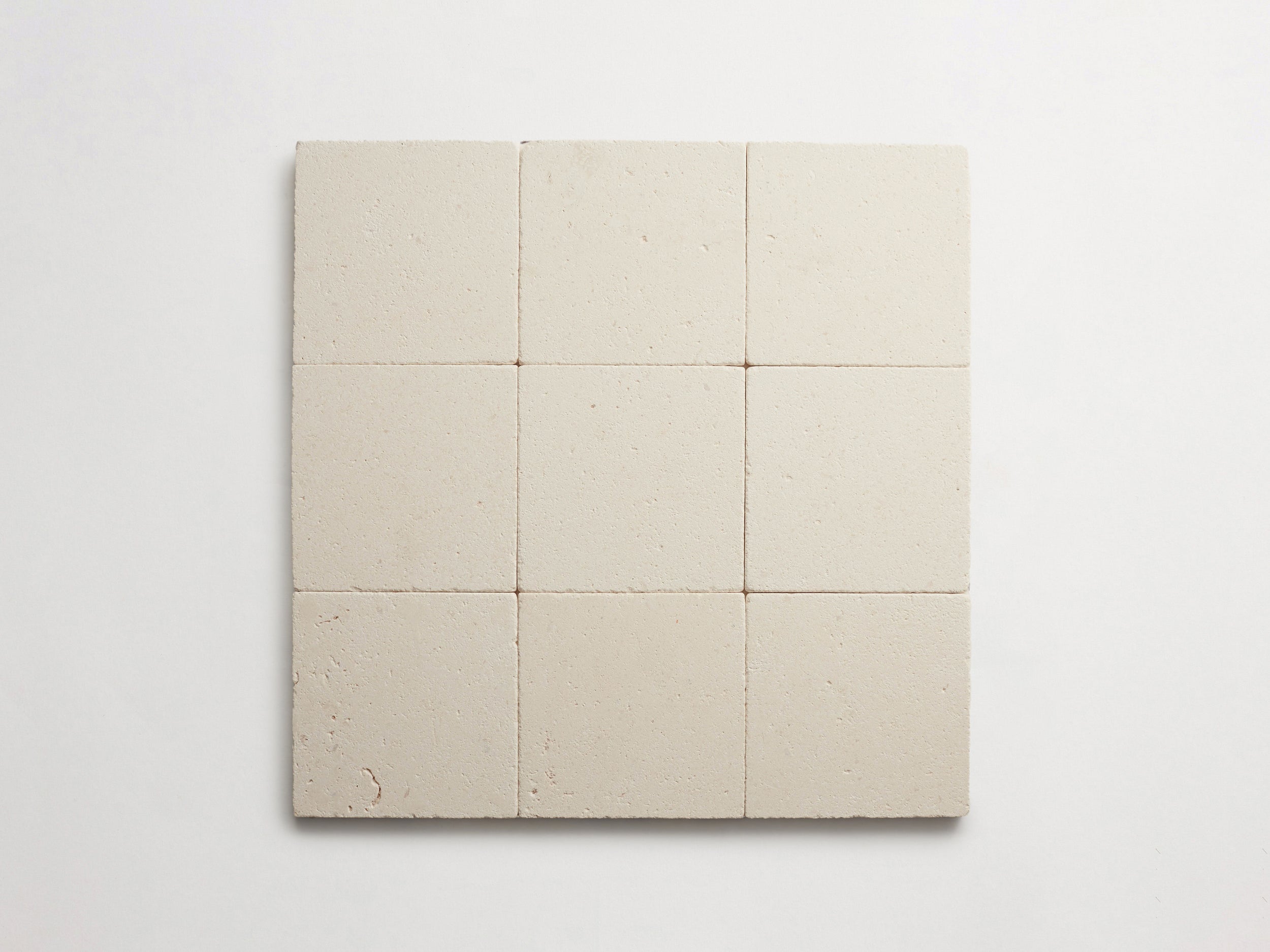cle-tile-stone-tumbled-lapidary-white-limestone-6x6-9up-3000x2250-300dpi.jpg