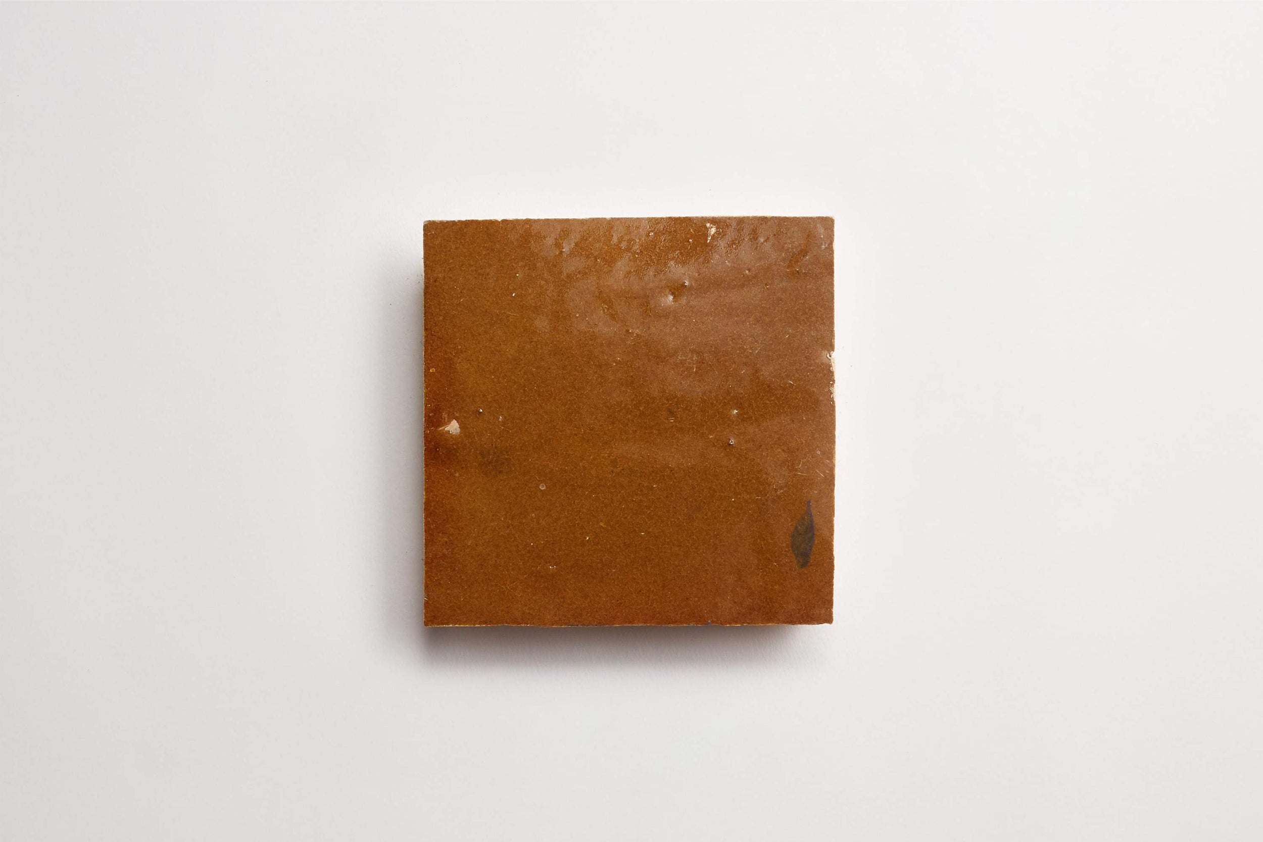 z10023_cle_tile_zellige_color_goldenhenna__4x4_single_overhead_main_3600x2400_1.jpg