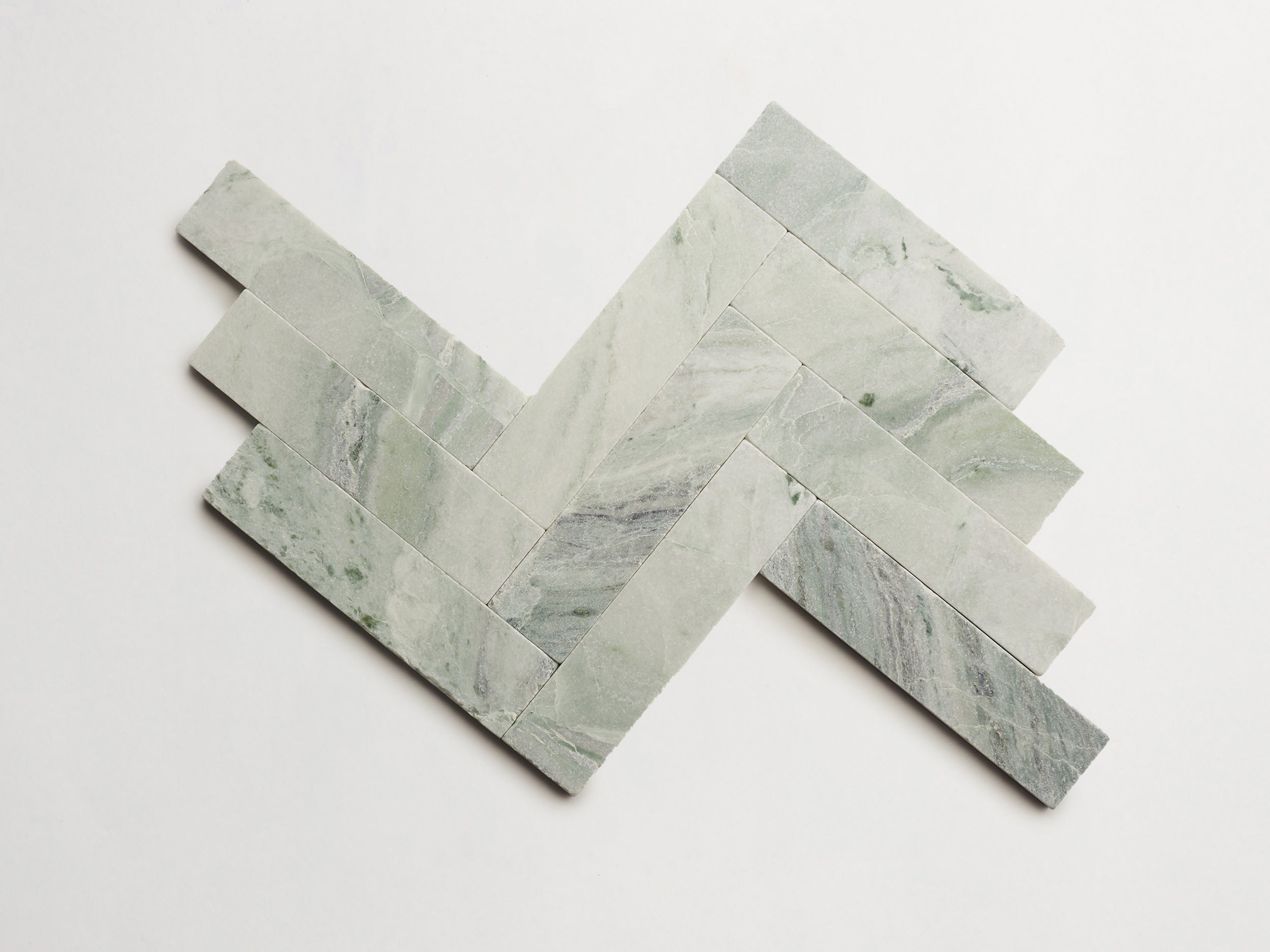 cle-tile-stone-tumbled-lapidary-jade-green-cigar-herringbone-3000x3000-300dpi.jpg