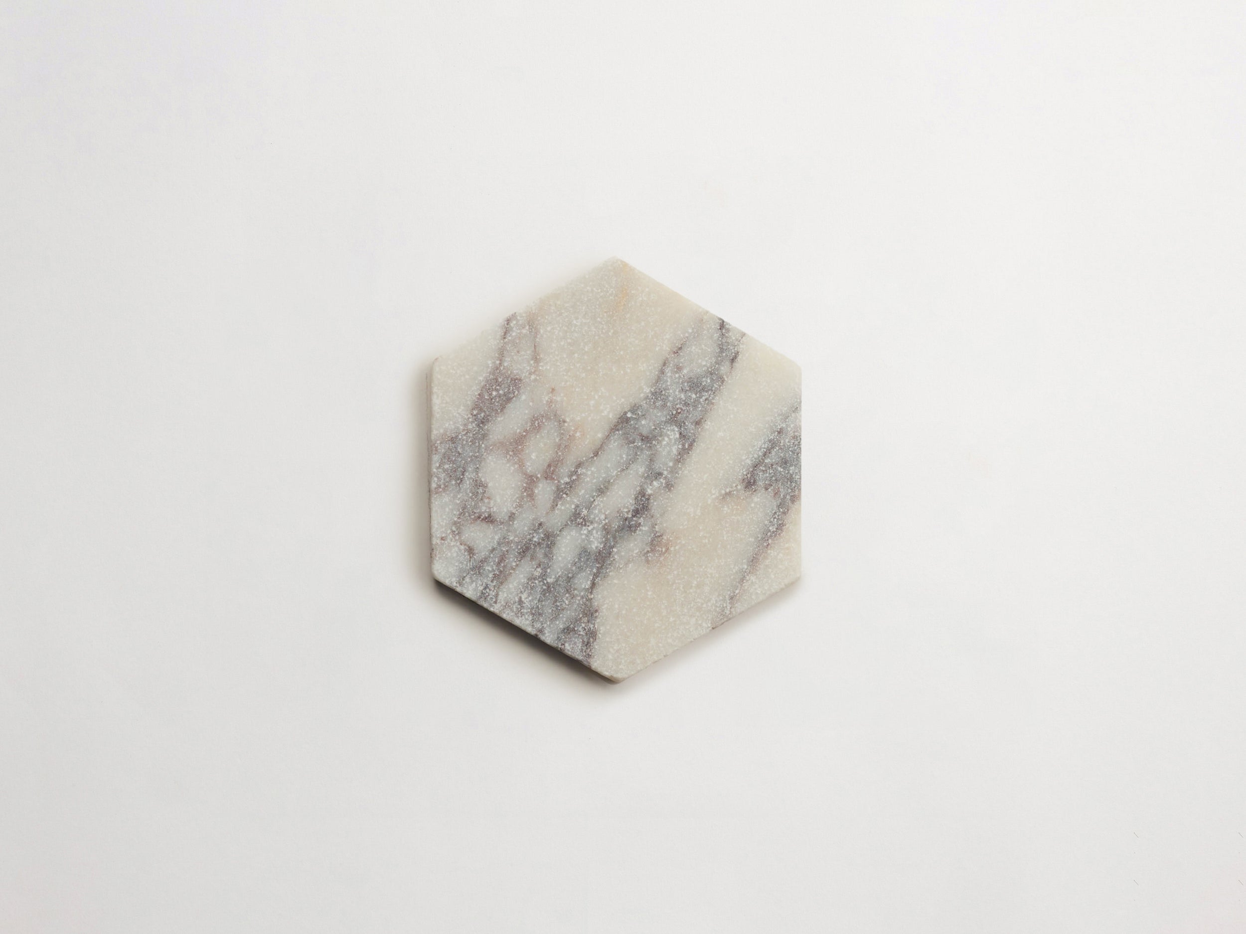 cle-tile-stone-tumbled-lapidary-calacatta-viola-hex-single-3000x2250-300dpi .jpg