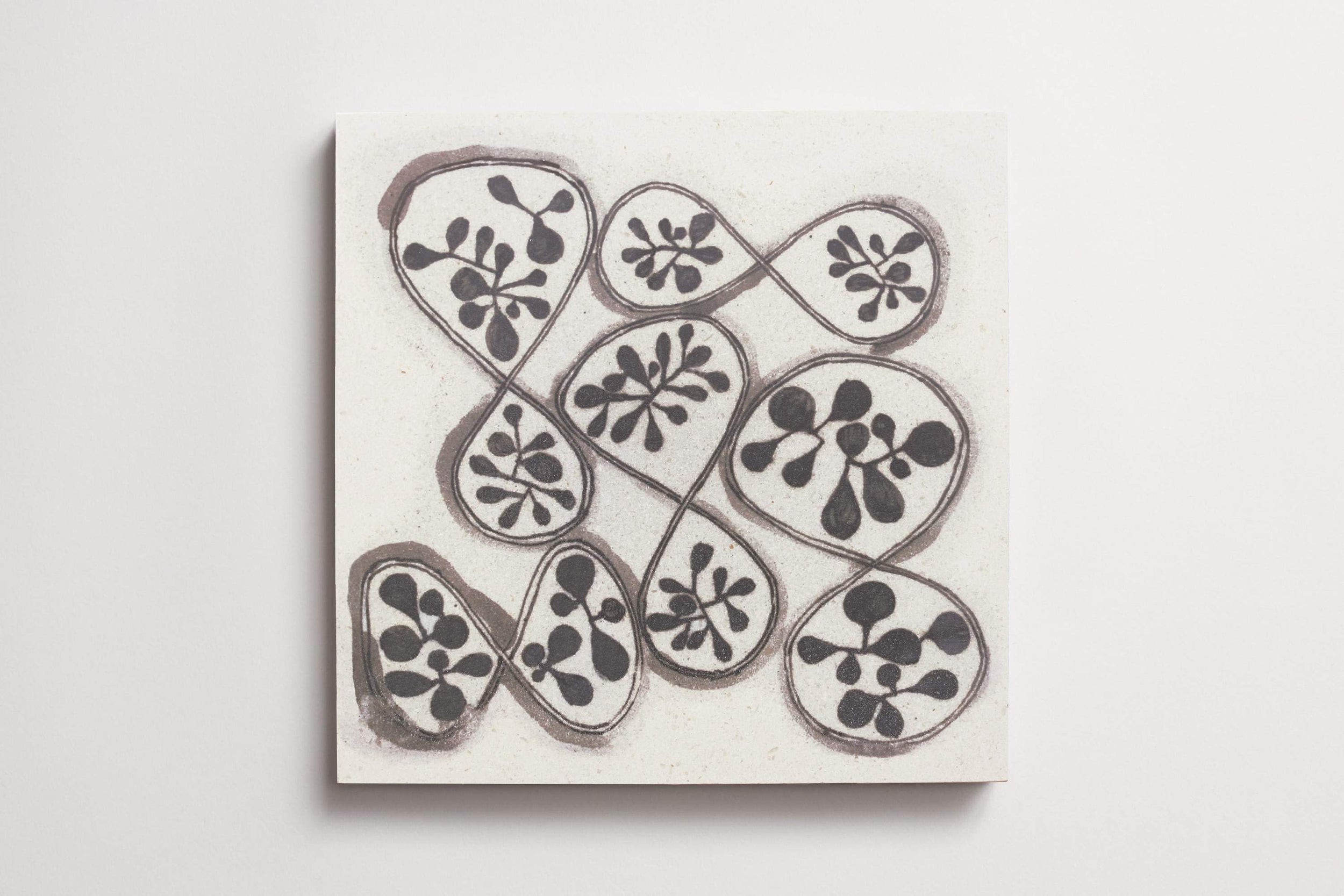 cle_tile_limestone_ruan_hoffmann_mlm_charcoal_sprout_pks_square_12x12_single_aerial3.0.jpg