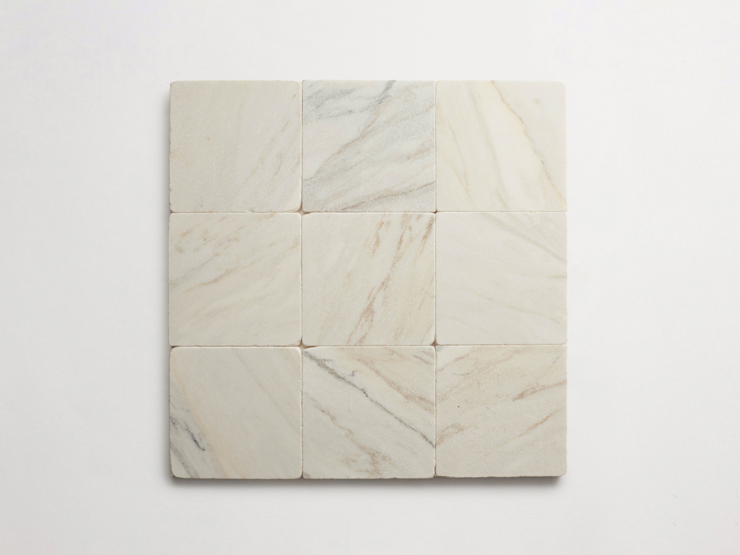 cle-tile-stone-tumbled-lapidary-calacatta-gold-6x6-9up-3000x2250-300dpi.jpg