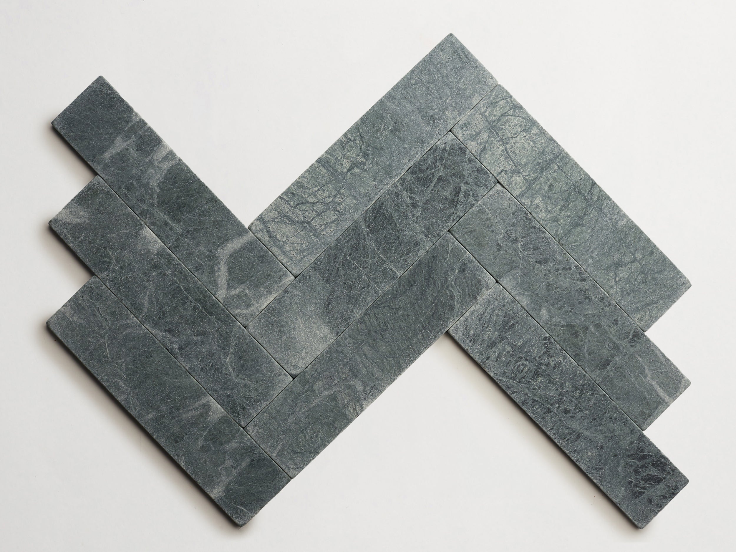 cle-tile-stone-tumbled-lapidary-verde-marble-blade-herringbone-3000x3000-300dpi.jpg